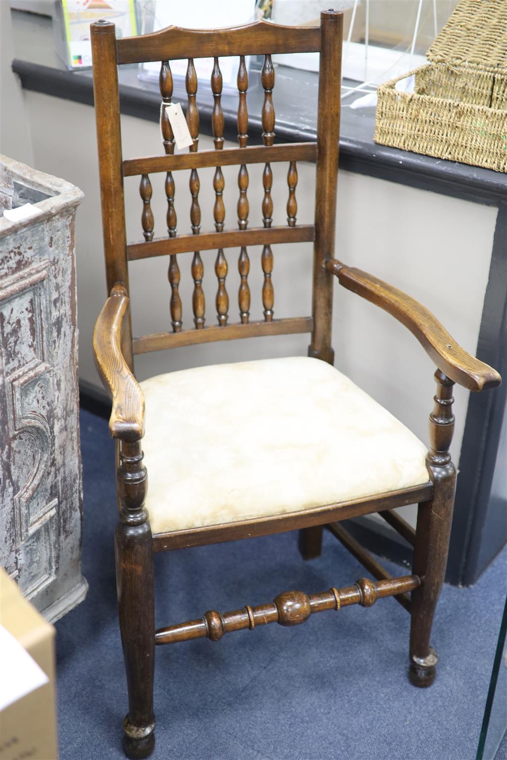 A 19th century ash Lancashire spindle back elbow chair